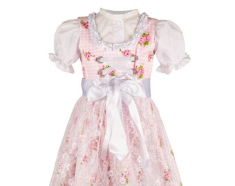 Festive baby dirndl made of cotton with a floral pattern in pink-white with an apron made of lace.