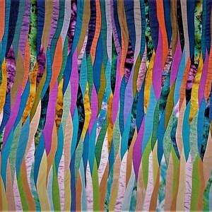May include: Abstract art quilt with a colorful, wavy pattern. The quilt is made up of many different fabric strips sewn together to create a flowing, organic design. The colors are vibrant and varied, including shades of blue, green, purple, orange, and yellow.