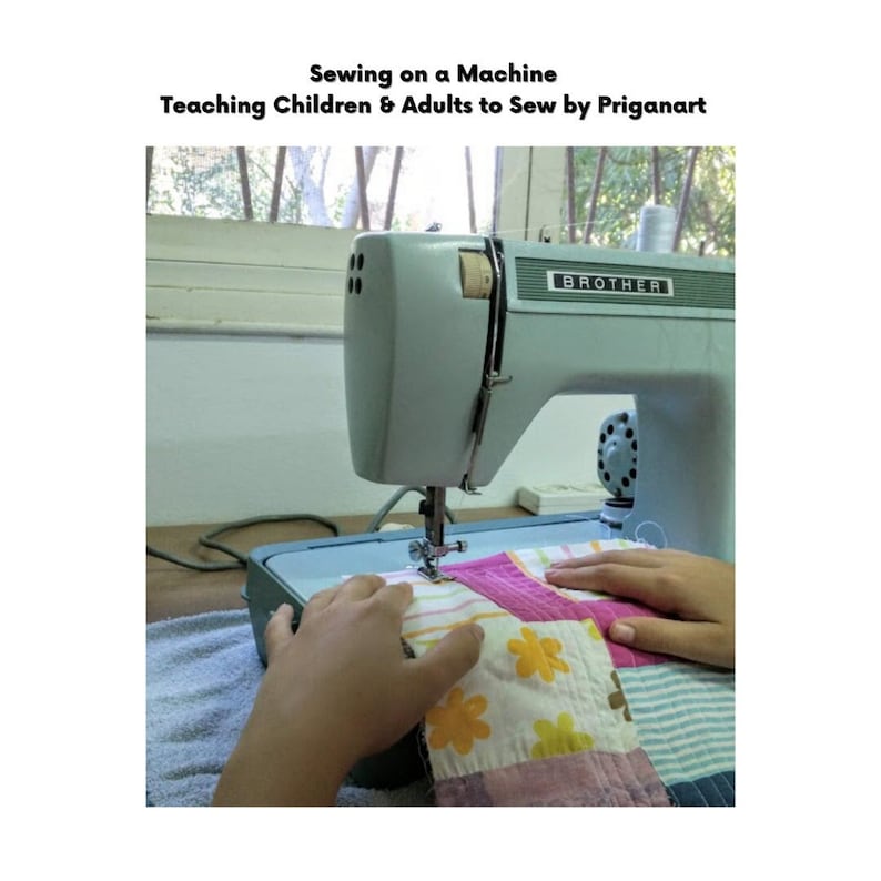 May include: A person is learning to sew on a Brother sewing machine. They are using a colorful patchwork fabric. The machine is light blue and has a white label that says "Brother".