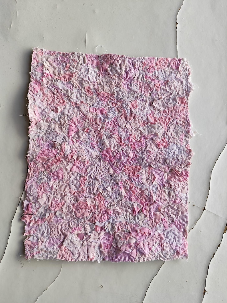 Pink scrapfabric made from many small pieces of fabricscraps