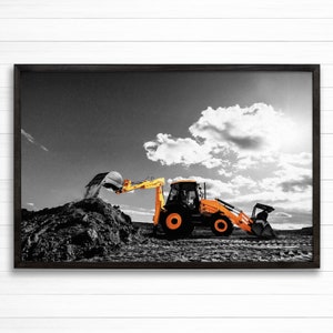 May include: A yellow backhoe excavator digs into a pile of dirt against a black and white background with a cloudy sky.