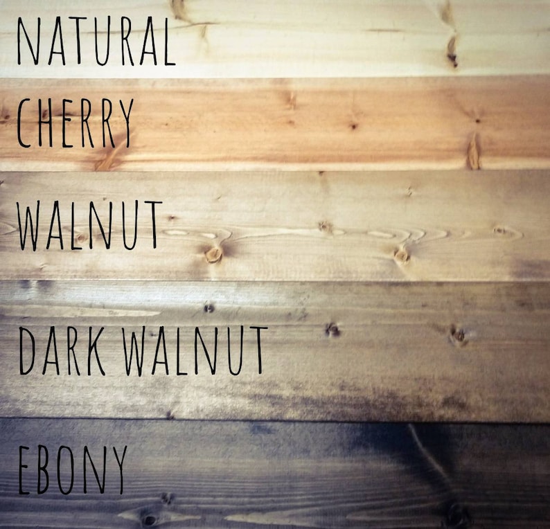 May include: Five wood samples stained in different colors: natural, cherry, walnut, dark walnut, and ebony.