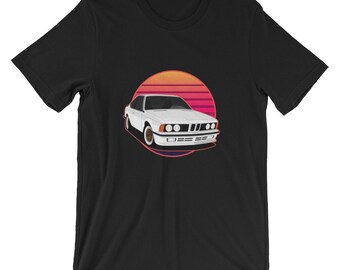 May include: A white vintage car with a red and orange sunset behind it. The car is in a circle with a purple outline. The background is black.