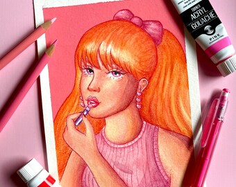 May include: A watercolor painting of a woman with orange hair wearing a pink top and applying lipstick. The background is a light pink color.