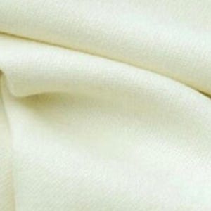 May include: A close-up of a smooth, off-white fabric with a subtle texture. The fabric is soft and appears to be made of natural fibers.