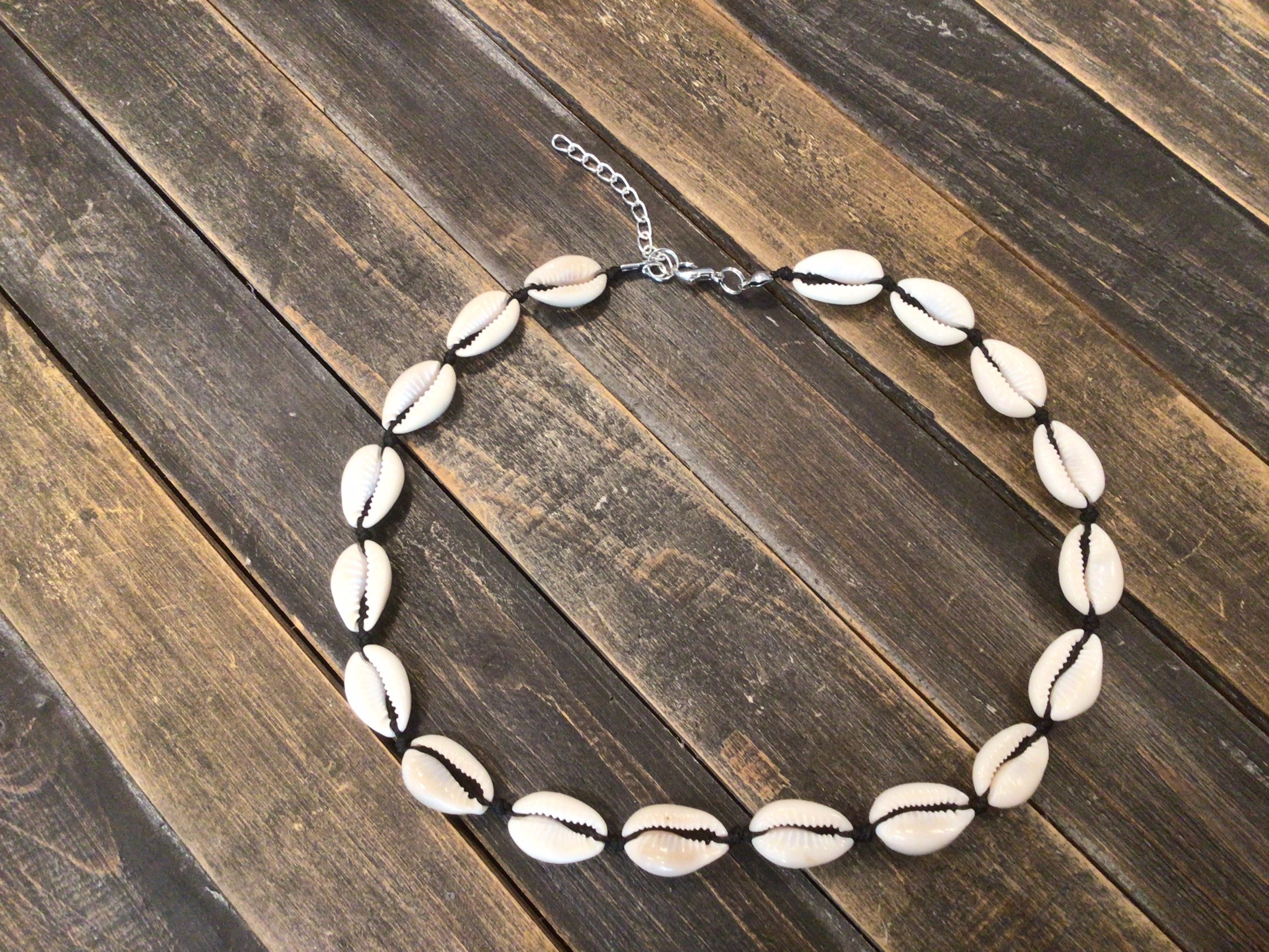 Gray toned, cowrie shell, black cord, choker, necklace