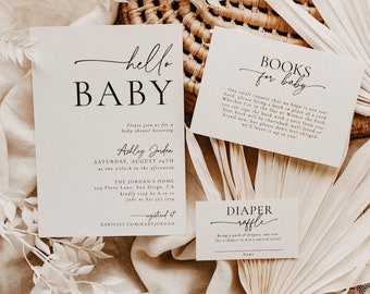 May include: A set of three cards for a baby shower. The first card is a white invitation with the text "hello BABY" and the details of the baby shower. The second card is a white card with the text "BOOKS for baby" and a request for guests to bring a book instead of a card. The third card is a white card with the text "DIAPER raffle" and a request for guests to bring a pack of diapers for a chance to win a prize.