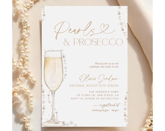 Puede incluir: Una tarjeta de invitación blanca con letras doradas para una despedida de soltera. La invitación presenta una copa de champán con perlas y el texto "Pearls & Prosecco". La invitación es para la despedida de soltera de Olivia Jordan el 12 de agosto a las 11:30 AM. La dirección es 29 Flora Ln, San Diego, CA. El número de RSVP es 831.555.1234. La invitación también incluye el texto "registered at Anthropologie Target".