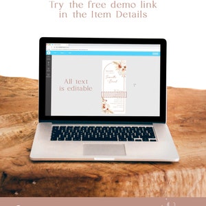 May include: A laptop computer screen displaying a wedding invitation template with a floral design. The text on the screen reads "Welcome to the Wedding of Samantha & David". The text "All text is editable" is also visible on the screen.