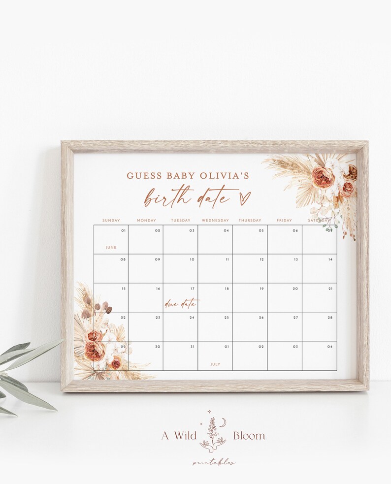 Puede incluir: Un juego de baby shower imprimible con un tema boho. El juego es un calendario con el texto "Adivina la fecha de nacimiento de la beb&eacute; Olivia" y un coraz&oacute;n. El calendario est&aacute; decorado con flores secas y hierba de la pampa.