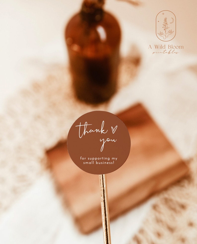 May include: A brown round sticker with white text that says "thank you" with a heart symbol and "for supporting my small business!"