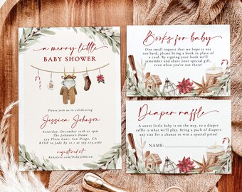 May include: A baby shower invitation suite with a rustic theme. The invitation features text, a clothesline with baby-themed ornaments, and greenery. Additional cards include requests for books and a diaper raffle. A gold wax seal is also present.