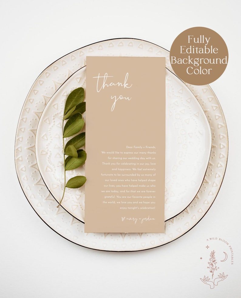 May include: A thank you card with a beige background and white text. The card says "thank you" in a script font and includes a message thanking family and friends for celebrating their wedding day. The card is sitting on a white plate with a decorative pattern.