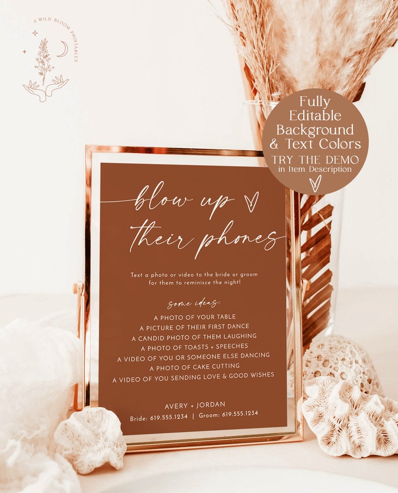 May include: A printable sign with a brown background and white text that says "blow up their phones". The sign is in a gold frame and has instructions for guests to text a photo or video to the bride and groom. The sign also includes some ideas for photos and videos, such as a photo of their first dance, a candid photo of them laughing, and a video of someone else dancing.