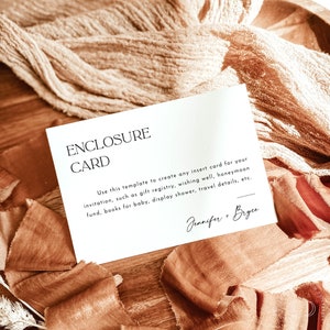May include: A white card with the text "Enclosure Card" in black. The card has instructions for using the template to create insert cards for various events, such as gift registries, wishing well, honeymoon fund, books for baby, display shower, travel details, etc. The card is signed "Jennifer + Bryce".