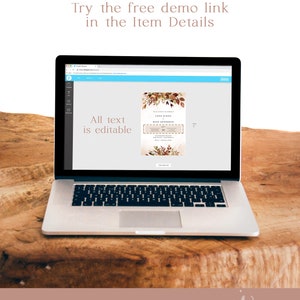May include: A laptop computer screen displaying a digital mockup of a fall-themed wedding invitation with the text "Luca Sloan & Ethan Anderson" and "Saturday, November 18, 2023". The text "All text is editable" is visible on the screen.