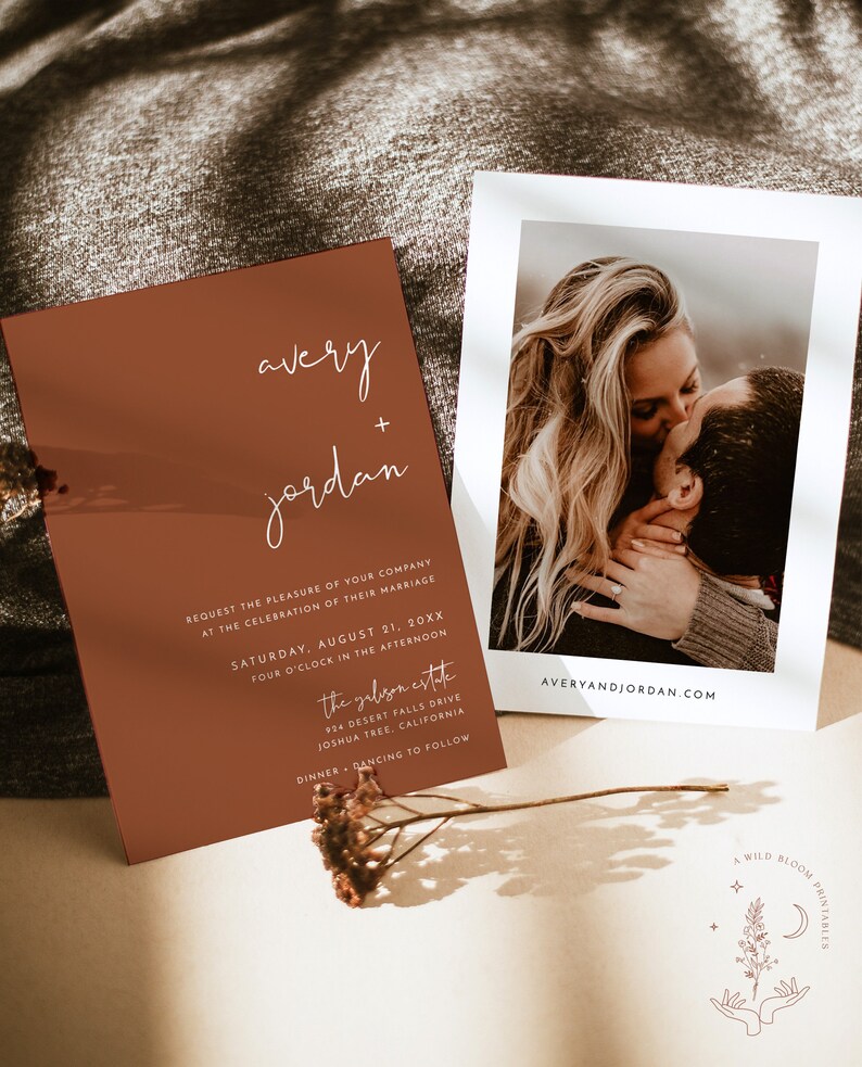 May include: A wedding invitation with a rustic brown background and white text. The invitation reads "avery + jordan" and includes the date, time, and location of the wedding. The invitation also includes the text "the gabizon estate" and "dinner + dancing to follow".