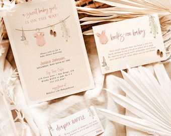 May include: A pink and white baby shower invitation with a floral design. The invitation includes the text "a sweet baby girl is on the way!" and details about the shower, including the date, time, and location. There is also a separate card that says "books for baby" and asks guests to bring a book in place of a card.