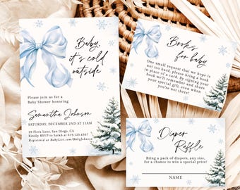 May include: Baby shower invitation set with a winter theme. The invitation, book request, and diaper raffle cards feature watercolor blue bows, snowflakes, and evergreen trees. The invitation reads "Baby, it's cold outside."