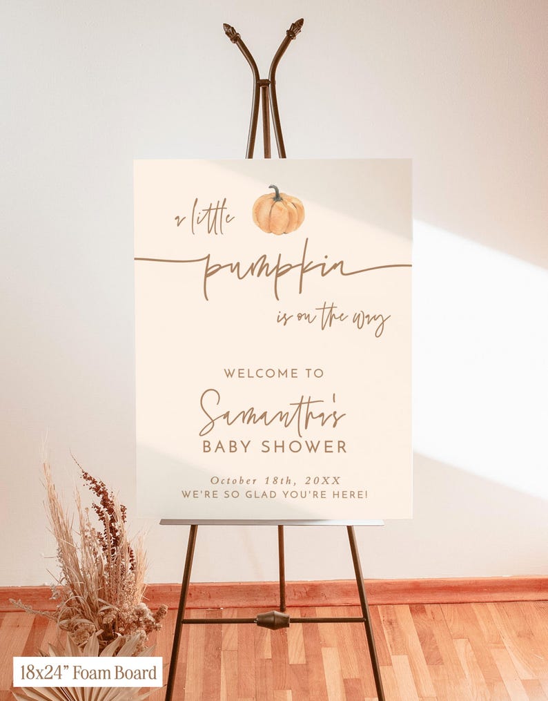May include: A rectangular 18x24 inch foam board sign on a metal easel. The cream-colored sign features a watercolor pumpkin illustration and brown text reading: A little pumpkin is on the way, WELCOME TO Samantha's BABY SHOWER, October 18th, 20XX, WE'RE SO GLAD YOU'RE HERE!