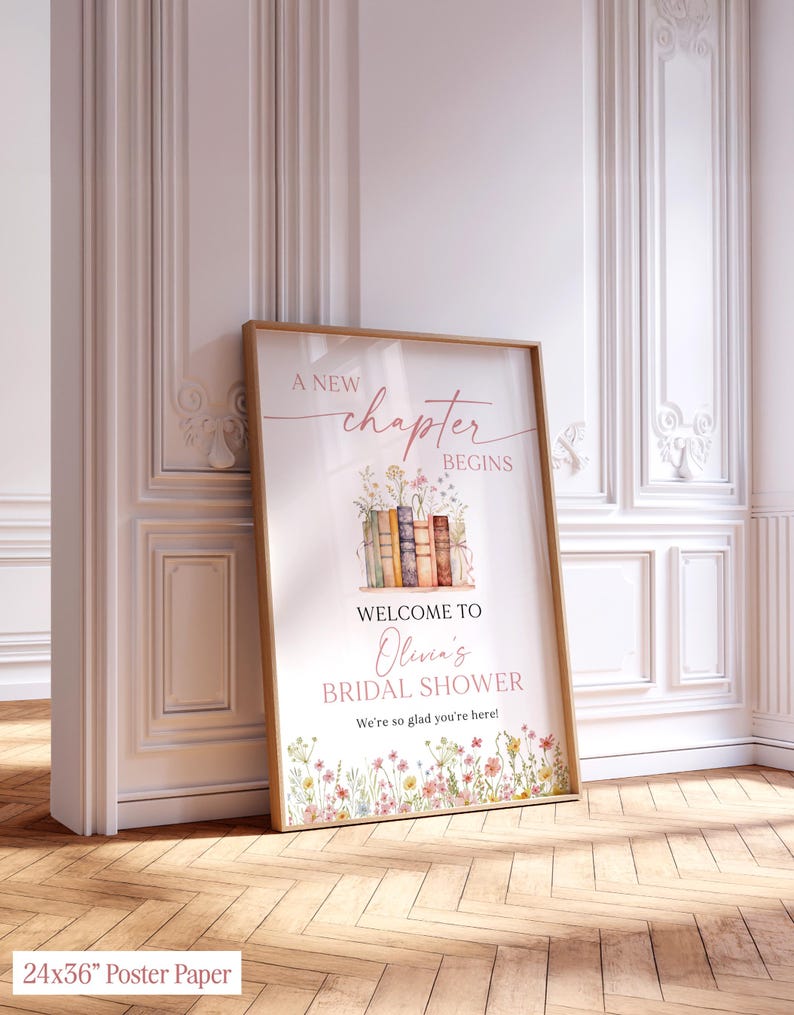 May include: A framed poster with the text "A New Chapter Begins" and "Welcome to Olivia's Bridal Shower". The poster features a floral and book design with a wooden frame. The poster is 24x36 inches.