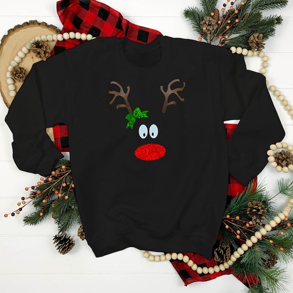 Reindeer Face Christmas Jumper | Cosy Black Unisex Xmas Jumper with Quirky Reindeer Face Design | Bestselling Christmas Jumper Day Ideas