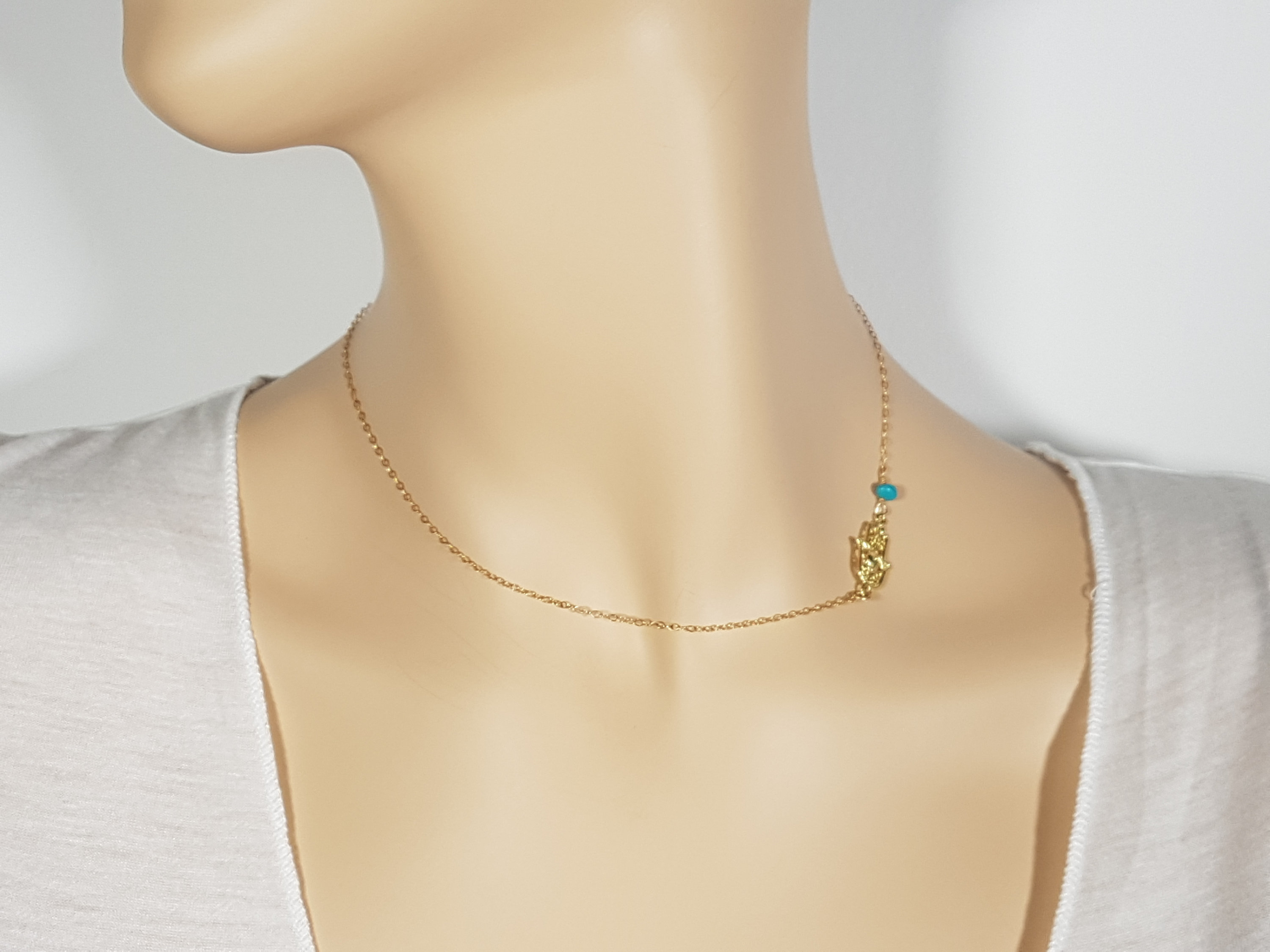 Sideways hamsa hotsell necklace