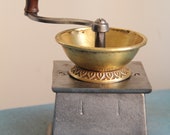 Antique English coffee grinder.