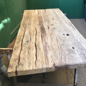 Reclaimed wood tabletops for dining and bathrooms. Price from €170.