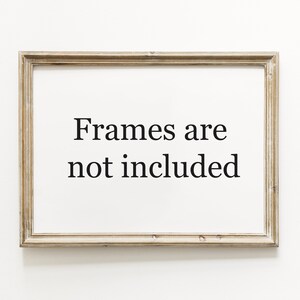 May include: A white frame with the text "Frames are not included" printed in black.