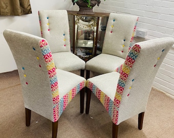 4   Dining chairs newly upholstered in Designers fabric