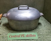 Wagner Ware Stylized Logo Magnalite Oval Roaster With Lid And Trivet P N 4562P Circa 1945 to the 1950s Vintage