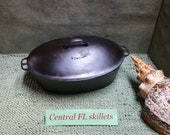 Wagner Ware 5 Stylized Logo Cast Iron Oval Roaster With Drip Drop Oval Lid And Aluminum Trivet Circa 1920s Vintage