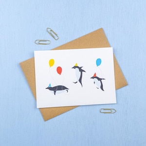 Penguin birthday party greetings card