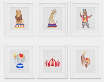 May include: Six white picture frames with colorful illustrations of circus animals and a circus tent. The frames are arranged in two rows of three. The top row features a lion, a tiger, and a ringmaster bear. The bottom row features an elephant, a circus tent, and a horse.