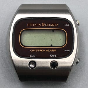 Vintage 1970s RARE MICROSTAR‎ 24mm SWISS DIGITAL ELECTRONIC LCD - REPAIRS/PARTS Vintage 1970s RARE MICROSTAR USA-SWISS DIGITAL ELECTRONIC  main image 4
