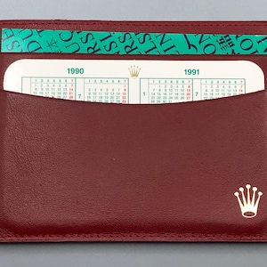 ROLEX NOS 1990/1991 Calendar Card Translation Booklet Burgundy Document Holder Wallet Lot Set Rolex models  Datejust Lady Date just etc.