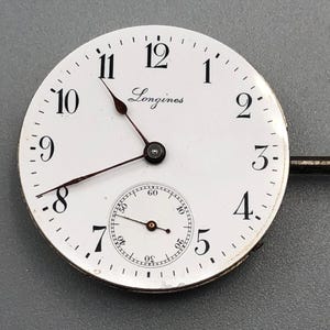 Vintage ANTIQUE LONGINES Cal. 13.56 Working Watch Movement Porcelain Dial Hands and crown