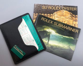 1990 NOS ROLEX SUBMARINER 16610 5513 16600 16618 Watch Manual Translation Booklet Calendar Hang Tag Document Holder Wallet Spanish Set Lot.