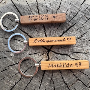 Keychain made of wood personalized with coordinates, name, engraving, letters, family pendants, pendant with leather cord