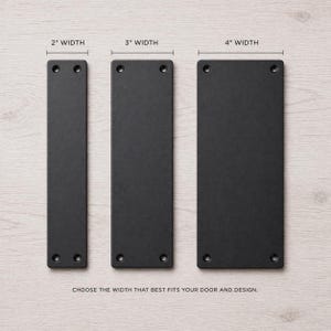May include: Three black rectangular door pulls with varying widths: 2 inches, 3 inches, and 4 inches. Each pull has four pre-drilled holes for mounting. The text at the bottom reads, "CHOOSE THE WIDTH THAT BEST FITS YOUR DOOR AND DESIGN."