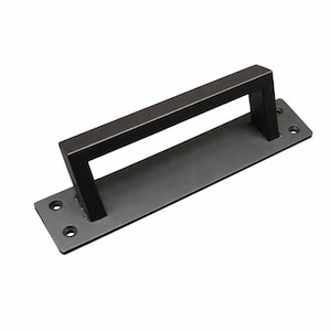 May include: A distressed white wooden sign displaying the word "Welcome" in a handwritten font. The sign has a rustic appearance, ideal for adding a touch of charm to a home's entrance or interior.