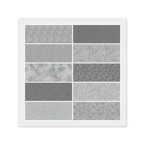 May include: A framed display of fabric swatches in various shades of gray. The swatches showcase different patterns, including floral, marble, and textured designs. The fabrics are arranged in a grid, offering a variety of options for crafting or design projects.