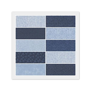 May include: A white-framed print showcasing ten fabric swatches in shades of blue. The swatches display various patterns, including floral, swirls, and textured solids. The color palette ranges from light to deep navy.