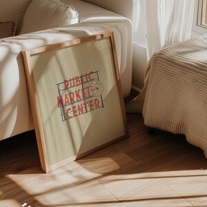 Illustration of Seattle, Washingtons iconic Public Market Center or Pike Place Market sign on a tan background