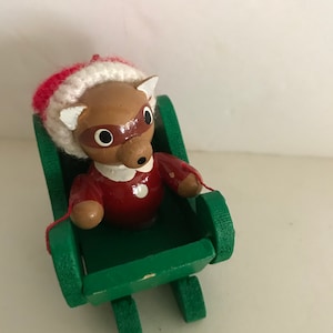 Vintage Wooden Christmas ornament/Raccoon in a Santa hat/sleigh animal Christmas ornament/Vintage Christmas/whimsical Christmas ornament