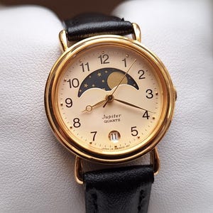Orient Jupiter moonphase watch, quartz watch, white watch, shows moon phase calendar, vintage watch, date indicator