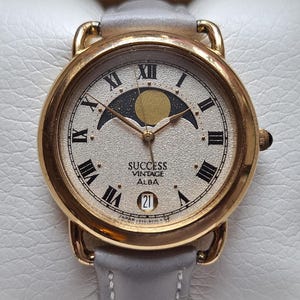 SEIKO クォーツ ムーンフェイズ 時計 ゴールド Vintage seiko moon phase - Etsy 日本