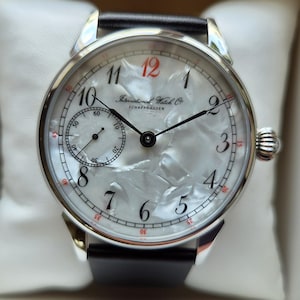 Relógio vintage Molnija Molnia IWC com mostrador perolado, calibre 3602, relógio mecânico.