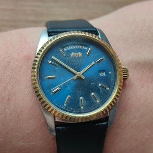 Orient president blue dial clearance